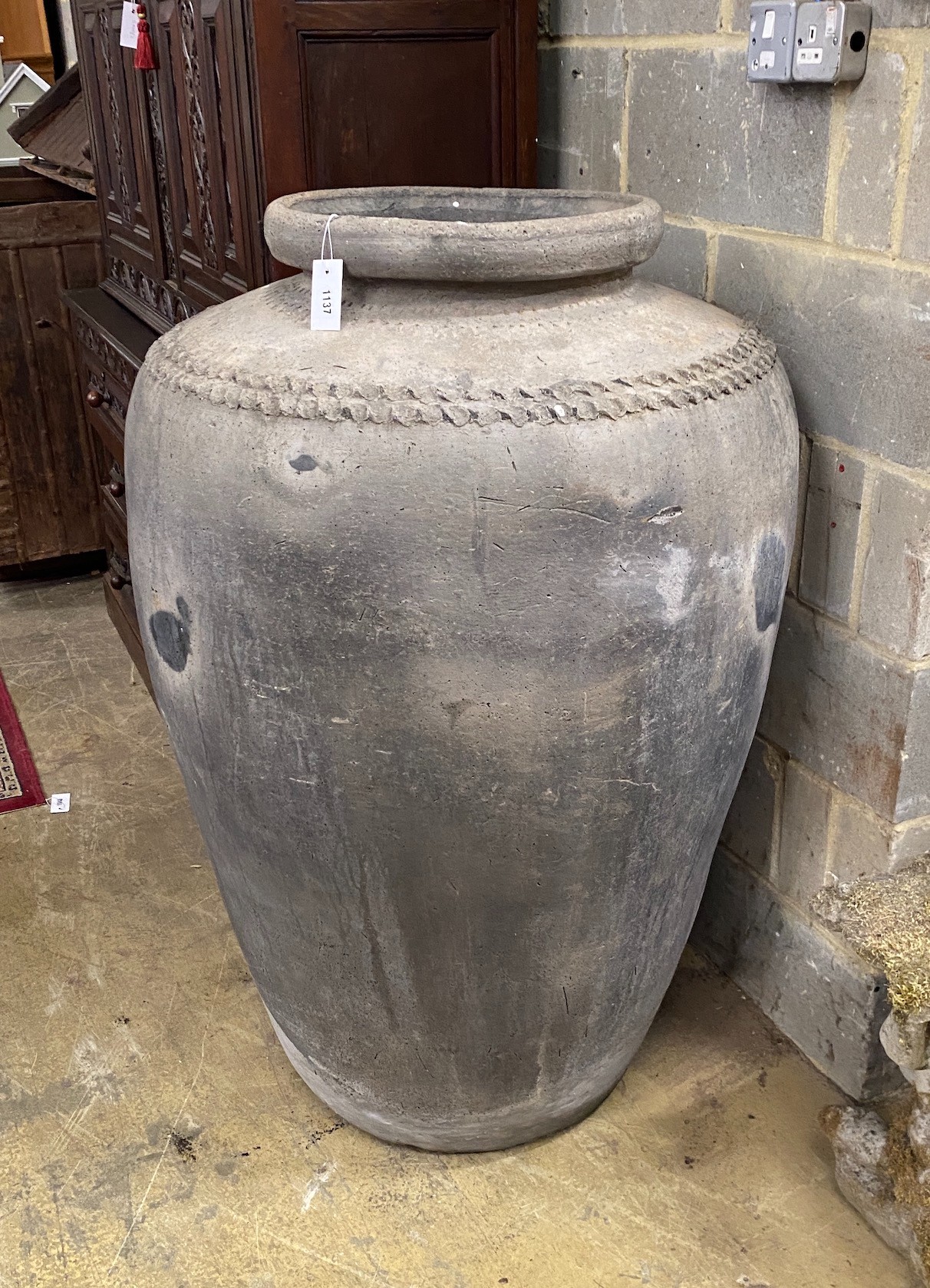 A large Greek style oil jar, height 123cm